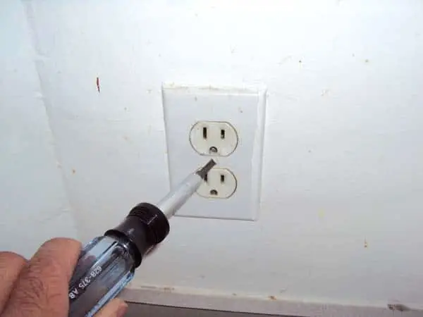 Removing wall outlet plate