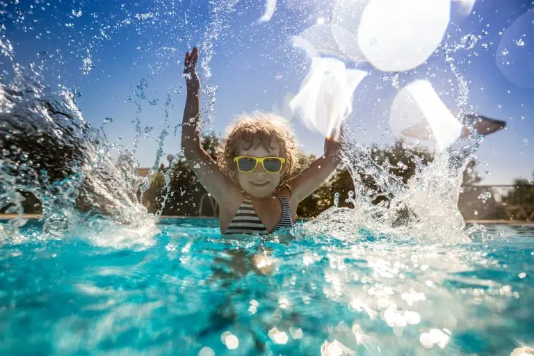 Exclusive Mosquito Control Features In Hollywood Florida Child playing in swimming pool